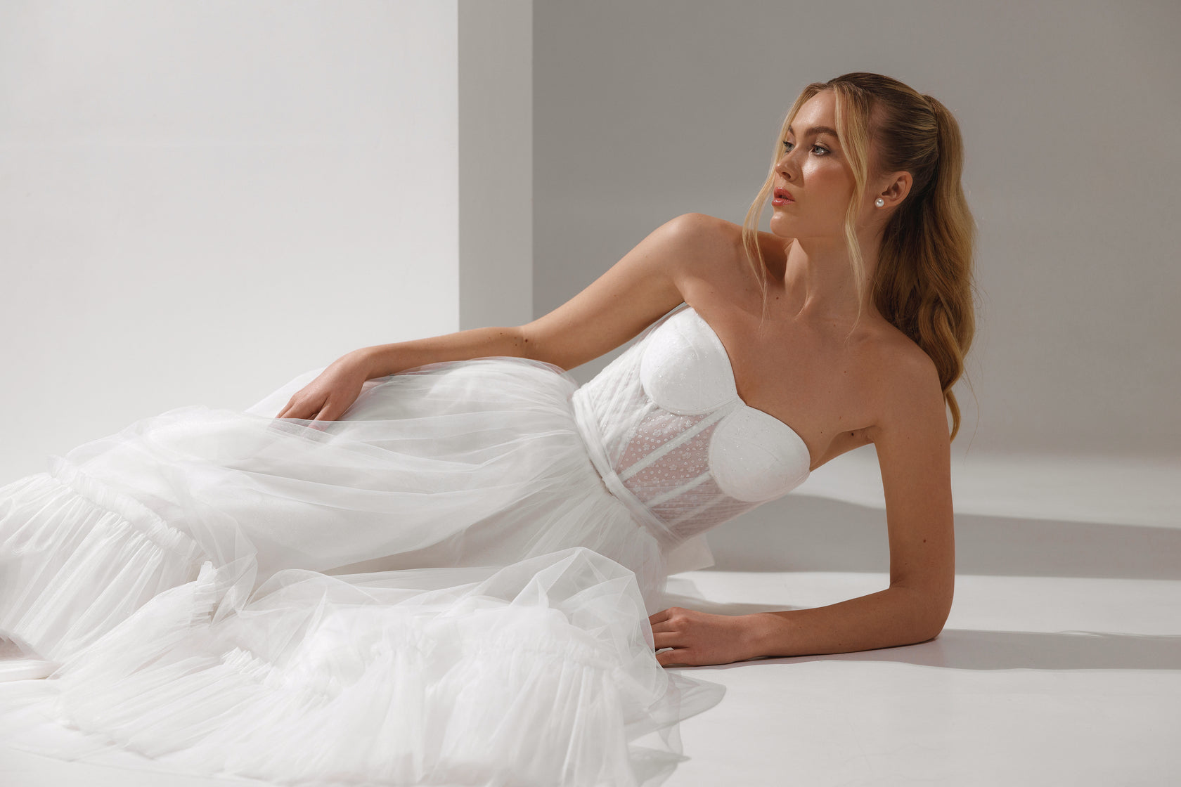 Close‑up of Alica’s neckline and premium fabric detail