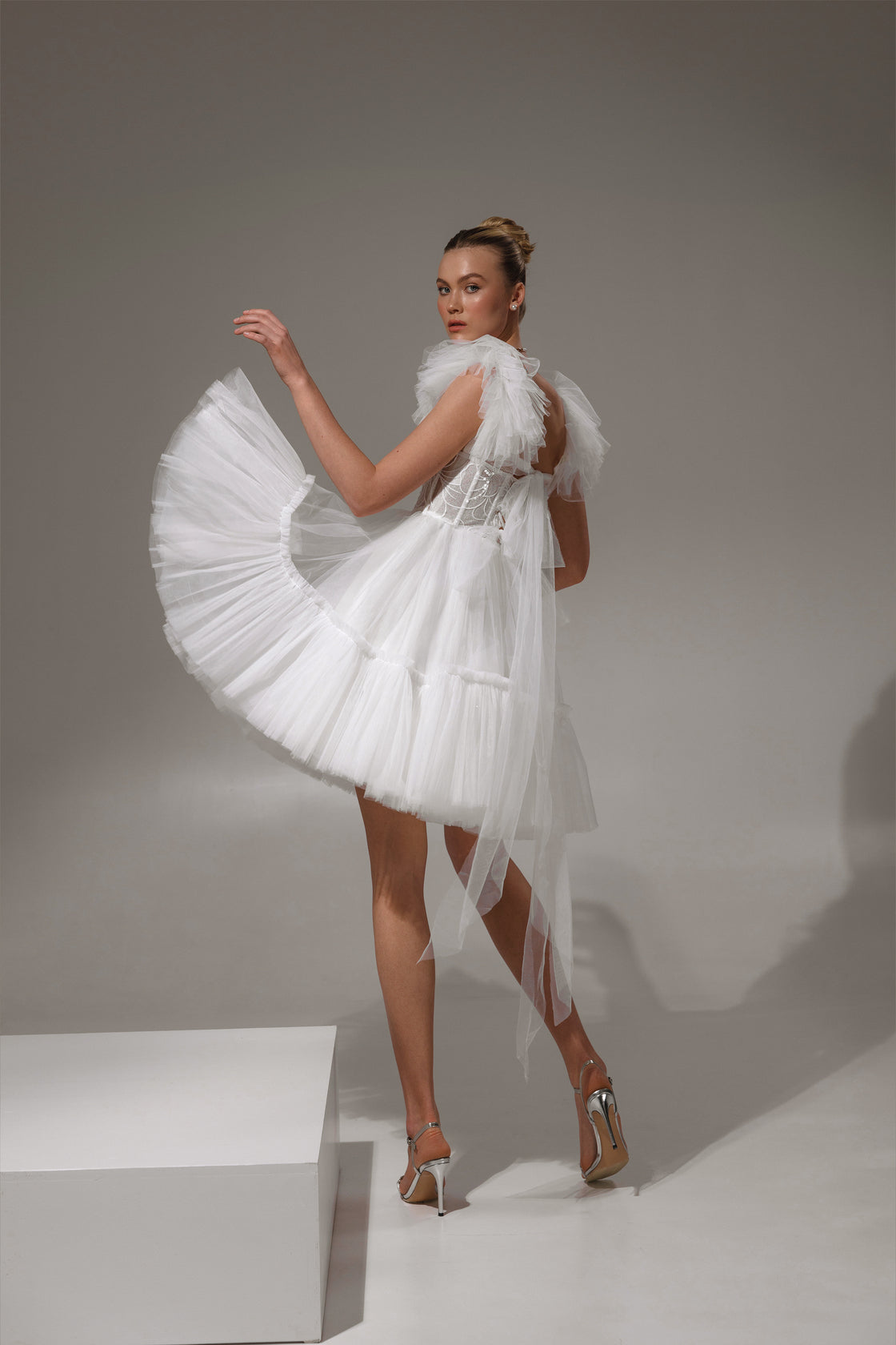 Mira gown back view with adjustable straps feature